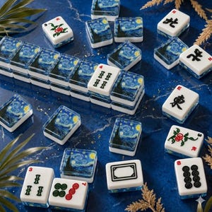 May include: A set of rectangular mahjong tiles featuring a mix of white tiles with black and red traditional symbols and tiles decorated with a blue and yellow starry night art print. The tiles are arranged in a scattered, overlapping pattern.
