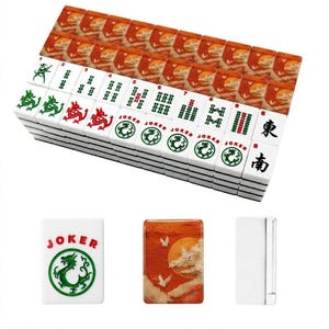 May include: A complete Mahjong set with white tiles featuring green and red symbols, numbers, and Chinese characters. The set includes tiles with a sunset design and the word "JOKER" with a green dragon. The tiles are stacked.