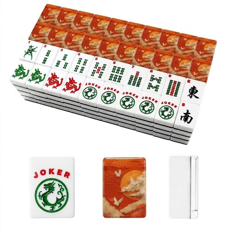 May include: A complete Mahjong set with white tiles featuring green and red symbols, numbers, and Chinese characters. The set includes tiles with a sunset design and the word "JOKER" with a green dragon. The tiles are stacked.