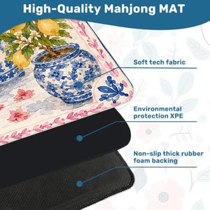 May include: A high-quality Mahjong mat with a watercolor design featuring a lemon tree in a blue and white pot. The mat has a soft tech fabric surface, environmental protection XPE, and a non-slip thick rubber foam backing.