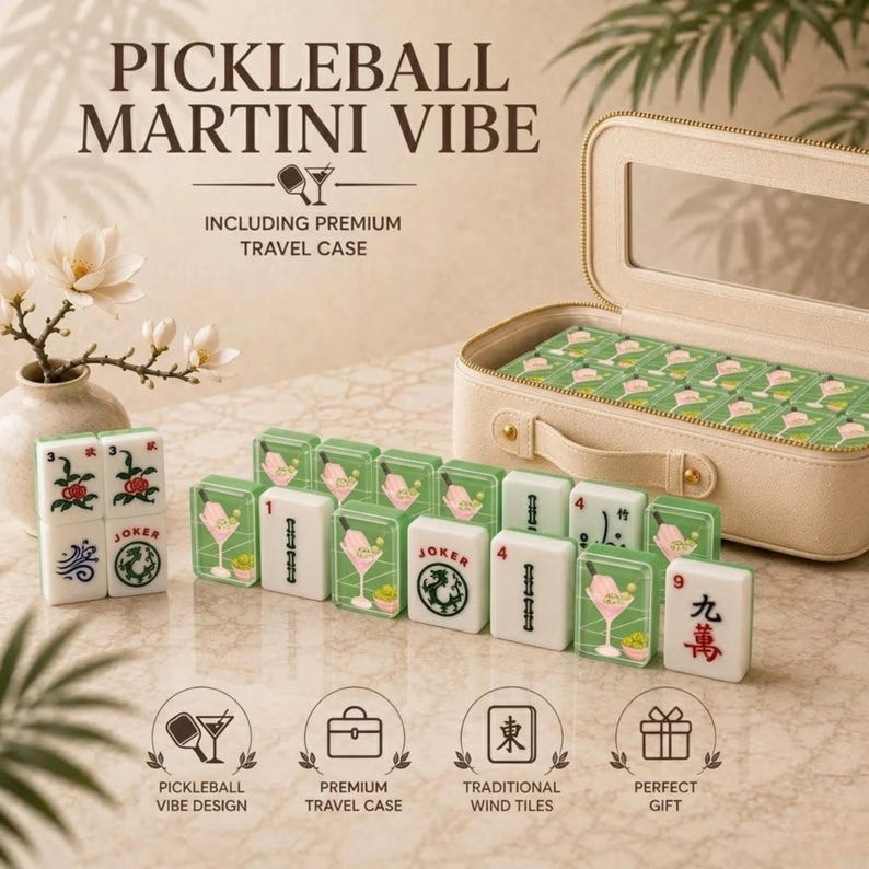 May include: A pickleball-themed mahjong set with a martini glass design. The set includes a premium travel case and traditional wind tiles. The tiles are white and green, with the text "PICKLEBALL MARTINI VIBE" at the top.