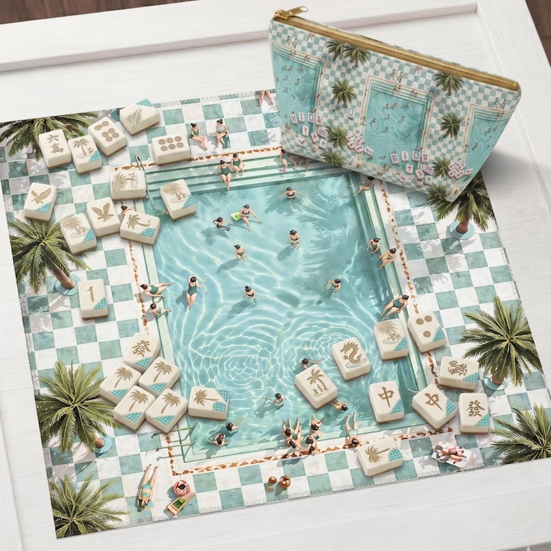May include: A complete Mahjong set with tiles, a playing surface, and a matching zippered pouch. The set features a pool-themed design with miniature figures swimming in a pool, palm trees, and a checkered background.