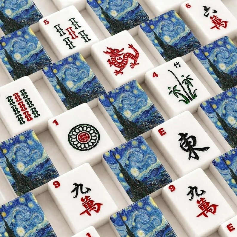 May include: A collection of white mahjong tiles featuring a blue and yellow swirling night sky art print on the back. The front of the tiles display various red, green, and black Chinese characters, numbers, and symbols including a red dragon icon.