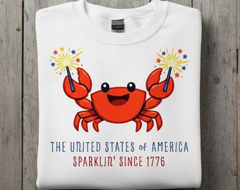 Camiseta infantil con diseño de cangrejo y bengalas de EE. UU.: Brilla desde 1776