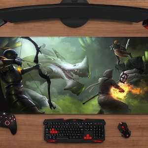 May include: A large rectangular gaming mouse pad featuring a fantasy battle scene with a dragon and warriors. The pad is surrounded by a keyboard, mouse, controller, and headset on a wooden surface.