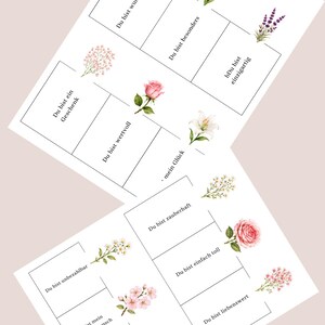 Op de afbeelding: Een set rechthoekige kaarten met bloemenillustraties en Duitse tekst, waaronder zinnen als Du bist wundervoll, Du bist besonders, Du bist einzigartig, Du bist ein Geschenk, Du bist wertvoll, mein Gl&uuml;ck, Du bist zauberhaft, Du bist einfach toll, Du bist unbezahlbar, Du bist mein Lieblingsmensch en Du bist so lieb.