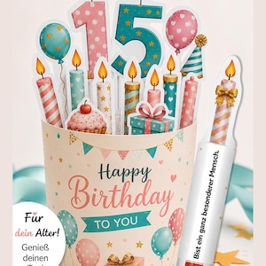 May include: A birthday greeting card featuring a pop-up design with the number 15, candles, balloons, a cupcake, and gift boxes. The card displays the text Happy Birthday TO YOU and includes a separate insert with the text Bist ein ganz besonderer Mensch.