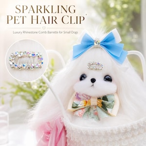 May include: A rectangular hair clip featuring clear, iridescent rhinestones set in a metal frame. The text SPARKLING PET HAIR CLIP and Luxury Rhinestone Comb Barrette for Small Dogs is visible above a white plush toy wearing a blue bow and floral collar.