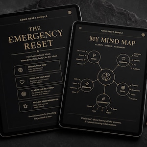 May include: Two black tablets displaying digital planners with gold text. The left screen shows The Emergency Reset with sections for grounding, regulating, and clarifying. The right screen shows a mind map with goals, passions, and focus.