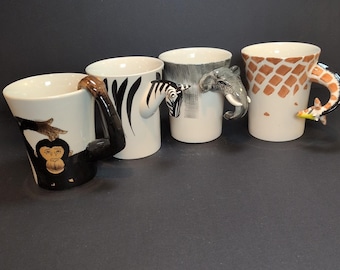 Pier 1 Imports Djurhandtag Keramik Kaffe 4 Muggar Zebra Elefant Giraff Apa