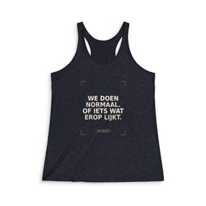 May include: A dark heather gray racerback tank top featuring the white text "WE DOEN NORMAAL. OF IETS WAT EROP LIJKT." enclosed in a thin gold-colored rectangular frame with corner accents and the small text "DAILY BALANCE" at the bottom.