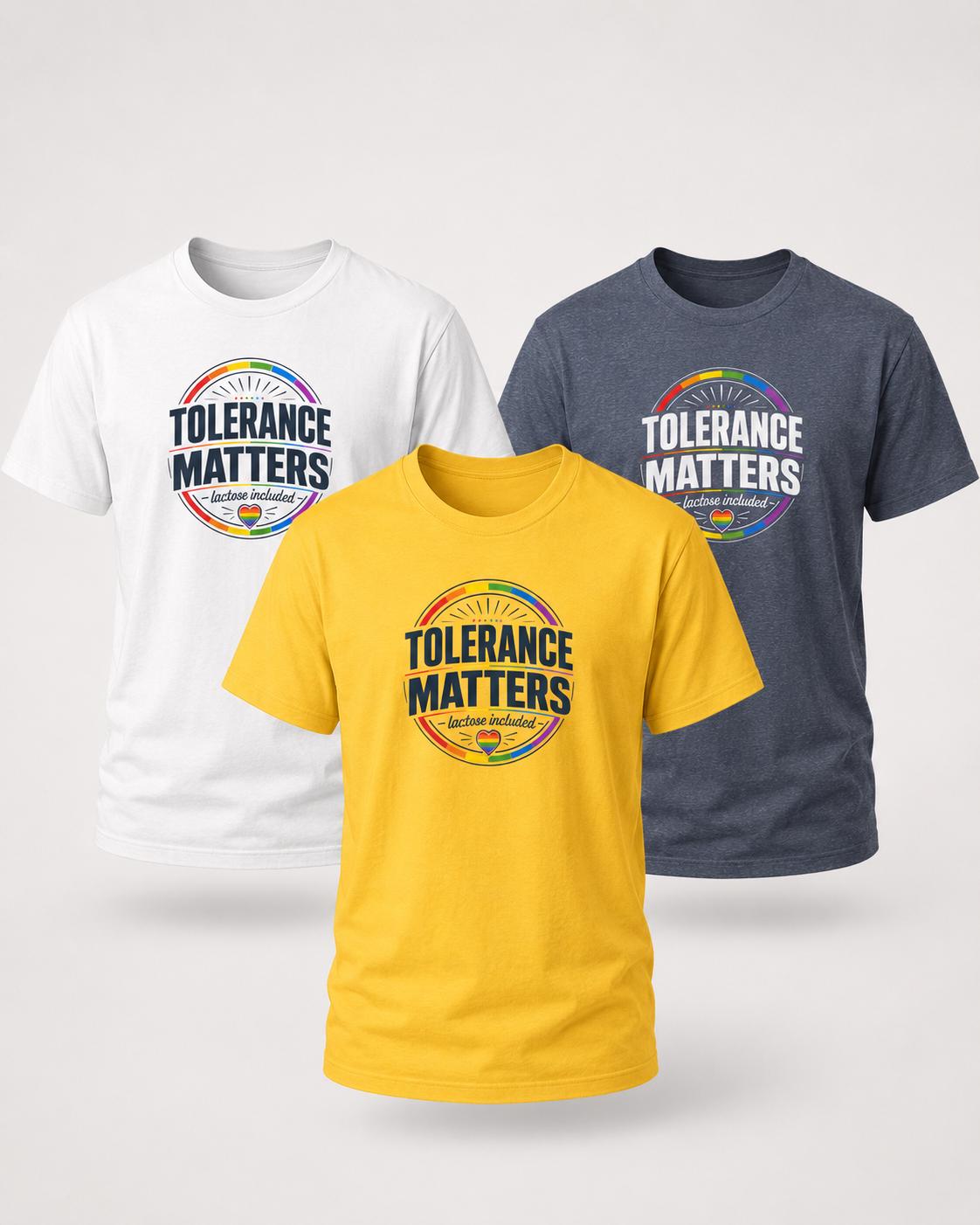 Drei T-Shirts in Weiß, Dunkelblau und Gelb mit 'Tolerance Matters' Aufdruck und Rainbow-Logo