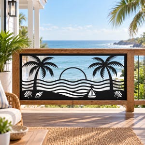 May include: A rectangular black metal decorative panel featuring a cutout design of two palm trees, a rising sun, wavy ocean lines, a small sailboat, and two seashells. The panel is mounted within a wooden railing frame on a porch.