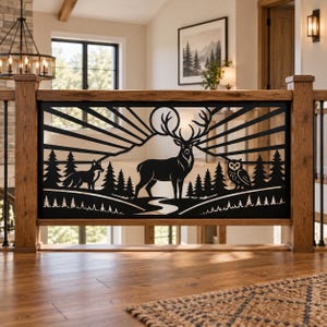 May include: A black metal railing panel featuring a laser-cut design of a central stag with large antlers, a fox to the left, and an owl to the right. The scene includes a forest of pine trees, a winding path, and a sunburst pattern in the background.