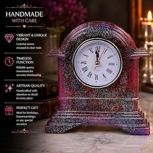 May include: A decorative quartz clock with a speckled red, purple, and black finish. The clock face is white with black Roman numerals and gold hands. The text "HANDMADE WITH CARE" is at the top.