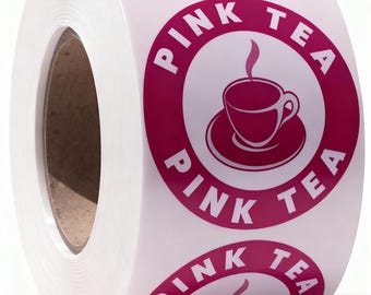 Puede incluir: Un rollo de etiquetas adhesivas blancas con un diseño circular magenta. Cada etiqueta muestra un icono de taza de té magenta sobre un platillo con vapor, rodeado por el texto PINK TEA en letras mayúsculas blancas dentro de un borde.
