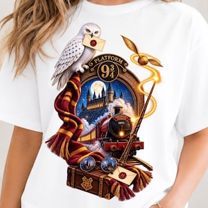 May include: A white t-shirt featuring a graphic print of a snowy owl holding an envelope, a red and gold scarf, a steam train labelled Hogwarts Express 5972, a castle, a golden snitch, a wand, round glasses, and a trunk with a crest.