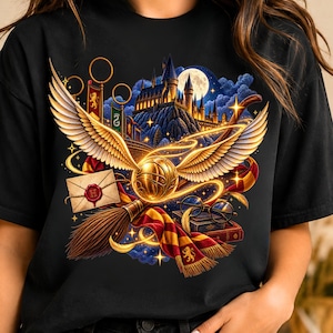 May include: A black t-shirt featuring a vibrant graphic print of a golden winged ball, a broomstick, a red and yellow striped scarf, a sealed envelope, round glasses, books, and a castle silhouette against a night sky with a full moon.