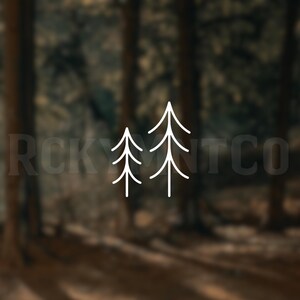 May include: A white line art graphic featuring two stylized evergreen trees of different heights, positioned side by side. The text RCKYMNTCO is displayed in a faint, semi-transparent font behind the central tree illustration.
