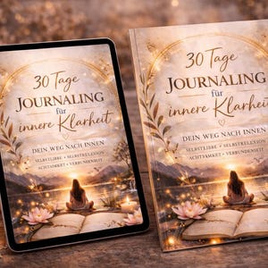 May include: An open book and a tablet display the title "30 Tage Journaling f&uuml;r innere Klarheit" with a serene illustration of a person meditating near water, surrounded by candles and flowers. The book and tablet are on a wooden surface.