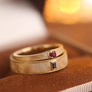 May include: A rustic wooden sign with the text "Welcome to our home" in white lettering. The sign features a distressed finish and a simple, inviting design, perfect for entryway decor.