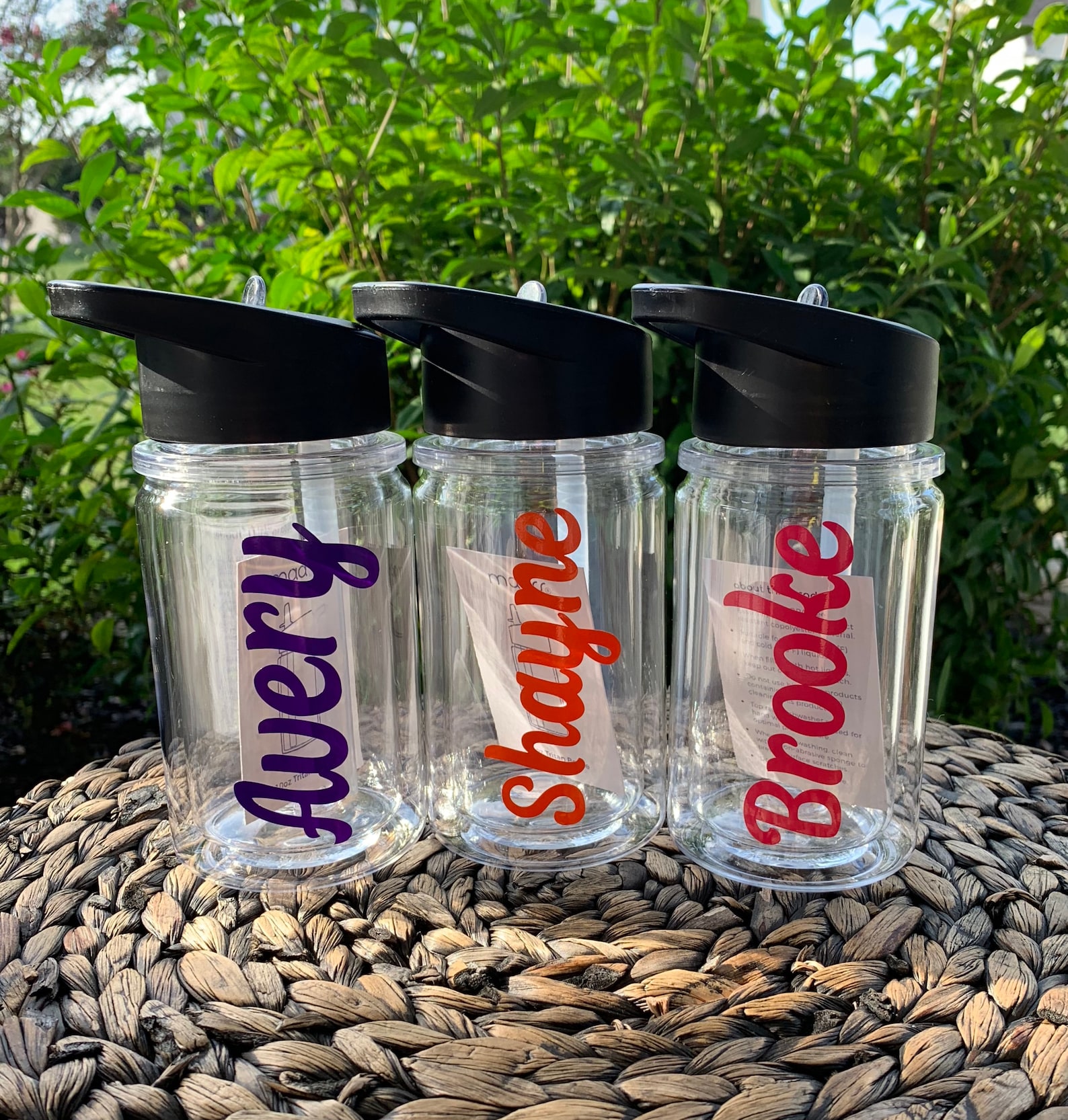 bottle with cup on top