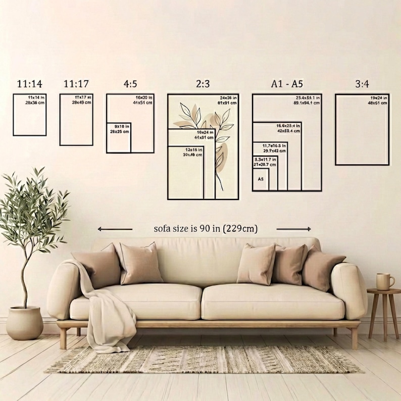 Puede incluir: Una gu&iacute;a de tama&ntilde;os de arte mural que muestra varias proporciones de marcos rectangulares, incluyendo 11:14, 11:17, 4:5, 2:3, A1-A5 y 3:4 con dimensiones en pulgadas y cent&iacute;metros, situada sobre un sof&aacute; beige de 229 cm de ancho.