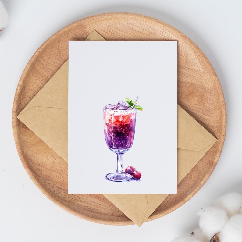 May include: A watercolor greeting card featuring a vibrant cocktail with purple and red hues, ice, and a mint garnish. The card is on a wooden tray with a brown envelope, suggesting a theme of beverages or celebrations.