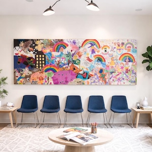 May include: A waiting room with a large, colorful abstract painting featuring rainbows and figures. There are six blue chairs, small wooden tables, and a round coffee table with magazines. The room has a neutral color palette with a patterned rug.