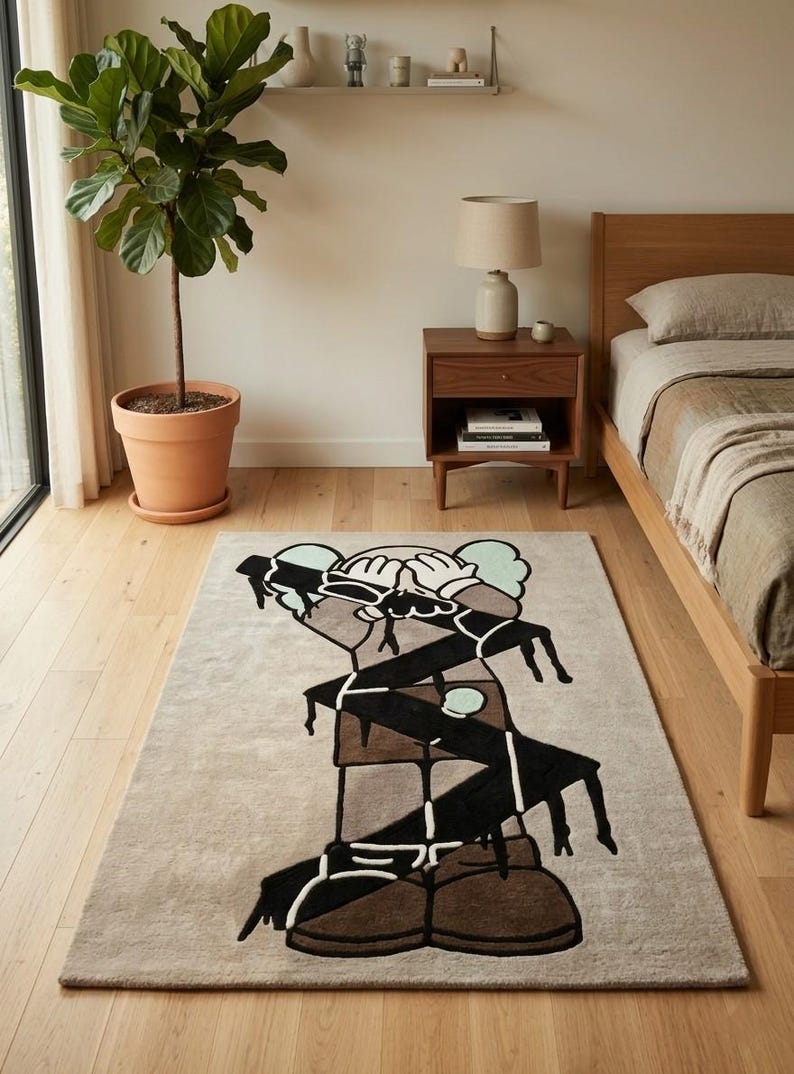 Modern abstract character area rug beside a wooden bed, luxury hand tufted wool carpet adding artistic charm to a minimalist bedroom.