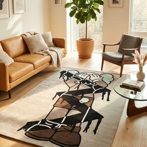 Luxury hand tufted wool area rug styled in a modern living room with leather sofa, contemporary furniture, and minimalist home decor.