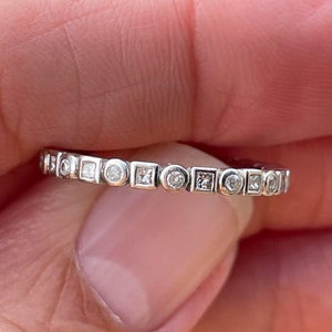 Ladies 65 point BEZEL set Diamond  Princess and round brilliant cut diamonds set in 14kt gold Stacker Band  Eternity Band—designer