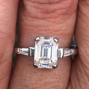 Emerald cut Moissanite with baguette diamonds Engagement ring in platinum