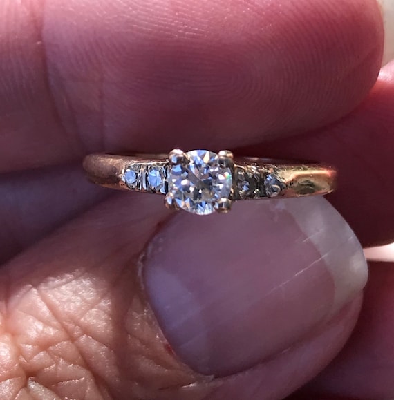 Traditional  Engagement Ring with a twist.. 14KT g