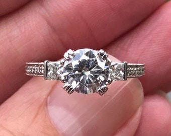 AMAZING Heavy platinum and diamond anniversary ring Engagement ring 82 points total weight of diamonds and 1.25 carat Moissanite.