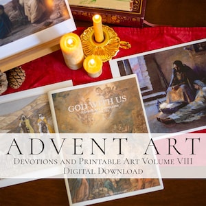 May include: A collection of printed art pages featuring religious imagery, including a booklet titled GOD WITH US Advent Art Devotions Volume VIII. Three lit pillar candles in a gold holder sit on a red cloth near a pinecone.