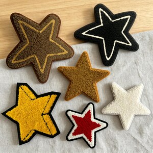 Patch met kleurrijke ster, regenboogborduurwerk opstrijkbaar