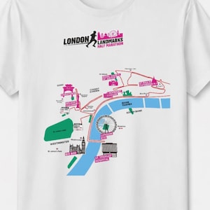 May include: White t-shirt featuring a map of London landmarks, including the London Eye, Big Ben, and the River Thames. The shirt also displays the text "LONDON LANDMARKS HALF MARATHON" in black and pink.