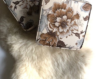 pair of brown floral foam box cushions square