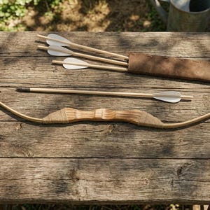 May include: A handcrafted wooden bow and arrows set on a rustic wooden table. The bow is light brown with a wrapped center, and the arrows have white fletching. A brown leather quiver holds additional arrows, suggesting archery equipment.