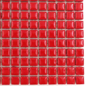 May include: Close-up of a mosaic tile sheet. The tiles are a glossy, square shape and are a vibrant red color. The tiles are arranged in a grid pattern, creating a uniform surface. This tile is suitable for various home decor projects.