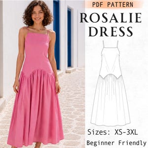 May include: A pink midi dress with thin spaghetti straps, a square neckline, and a gathered skirt section. The image includes a black and white line drawing of the dress pattern labelled PDF PATTERN ROSALIE DRESS with sizes XS-3XL listed.