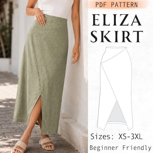 Puede incluir: Una falda midi de color verde salvia con cintura alta y una abertura frontal, combinada con una parte superior blanca. La imagen incluye el texto PDF PATTERN ELIZA SKIRT, un dibujo lineal de la falda y el texto Sizes: XS-3XL Beginner Friendly.