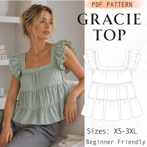 May include: A sage green tiered top with a square neckline and ruffled cap sleeves. The image includes a black and white line drawing of the garment labeled PDF PATTERN GRACIE TOP with sizes XS-3XL and the text Beginner Friendly.