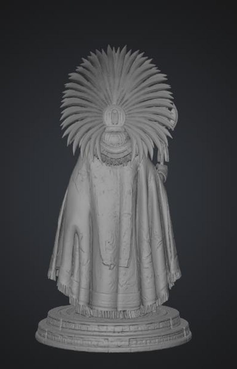 May include: A monochromatic gray 3D rendered figurine of a figure wearing a large, elaborate feathered headdress and a long, flowing cloak with a fringed hem. The figure stands on a circular, tiered pedestal base with intricate geometric carvings.