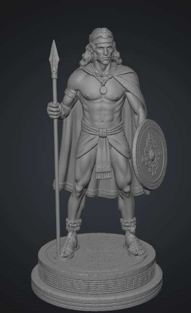 May include: A gray monochromatic figurine of a warrior standing on a circular base. The figure wears a headband, a cape, a loincloth, and sandals, holding a long spear in the right hand and a round shield with geometric patterns in the left hand.
