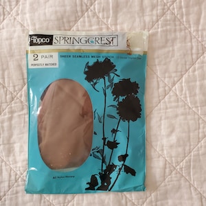 Medias de nailon vintage de los años 60/70, 2 pares, nuevas en su empaque original, empaque gráfico en color rosa aguamarina, transparentes, sin costuras, 15 denier, cristalino, 9.5