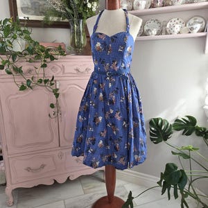 50s style halter dress Unique Vintage Black Criss Cross Halter Rita Flare Dress