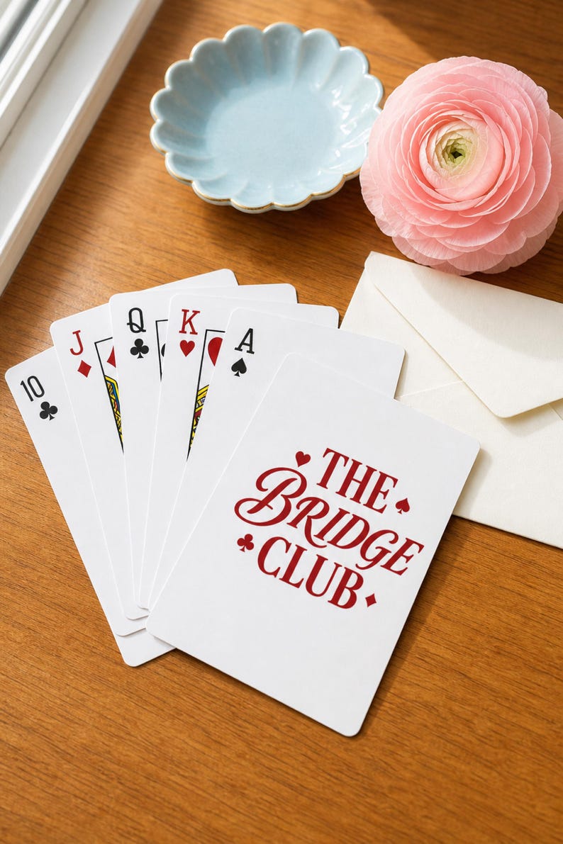Poker Cards bridge playing card deck — standard card faces shown in a clean preppy editorial product shot on warm wood; personalized card game gift showing front card detail.