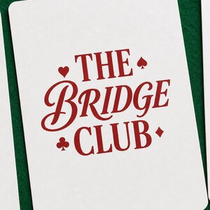 Macro close-up of Poker Cards custom bridge deck printed card back — personalized playing card design detail on smooth card stock, preppy editorial macro photography.